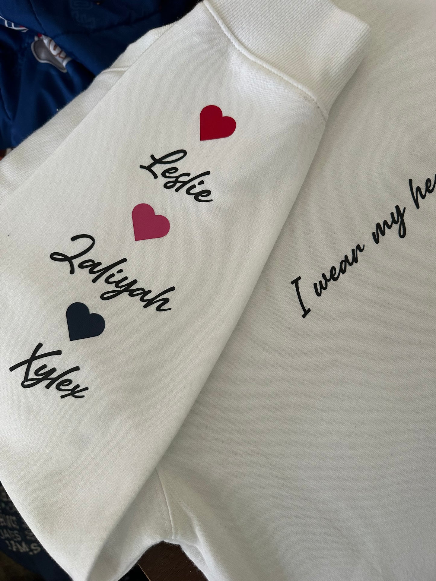 “i wear my heart on my sleeve”fleece crew